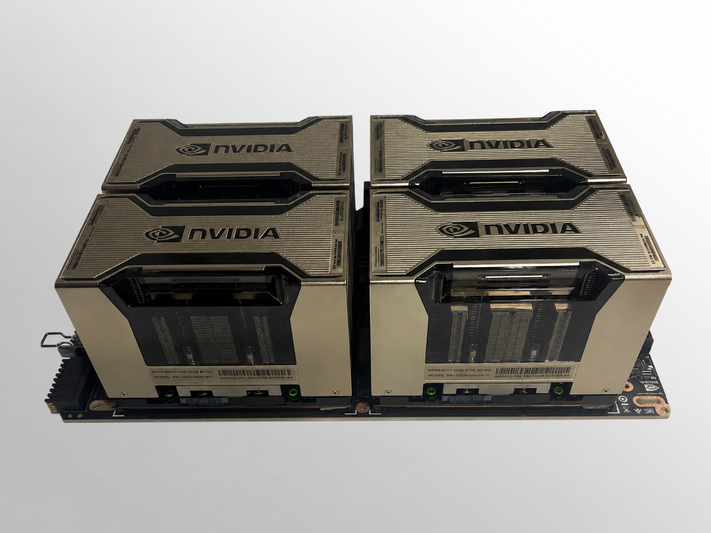 Four NVIDIA H200 SXM GPU modules mounted on a node baseboard
